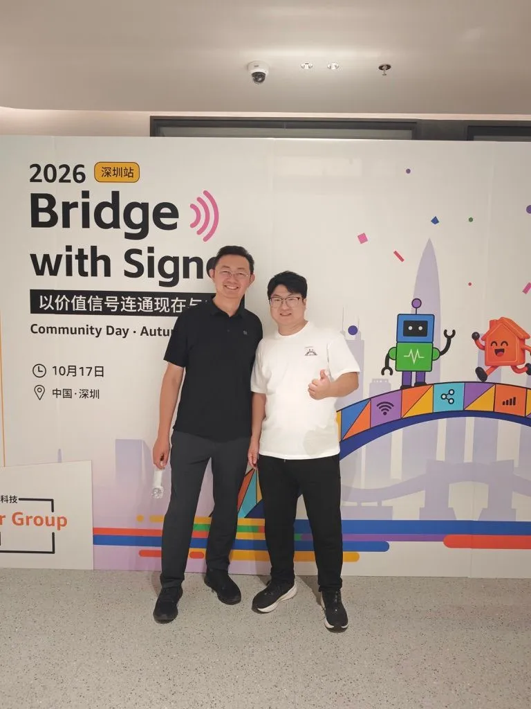 Friends at AWS Community Day Shenzhen Sheng and a friend at AWS Community Day Shenzhen 2026.